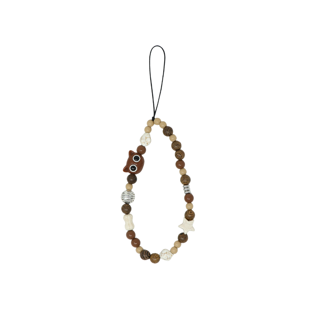 Caser Custom Brown Wooden Owl phone charm, detail view