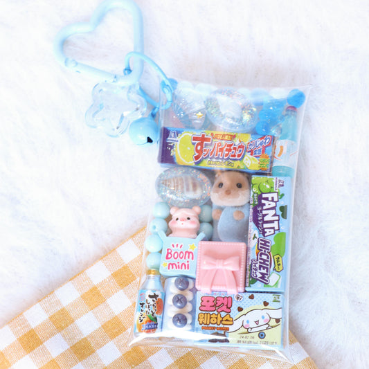 Packaged toy set with characters on a white background