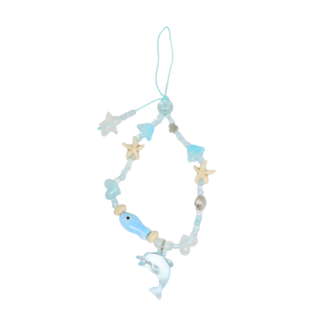Caser Custom Brown Baby Blue Dolphin phone charm, detail view