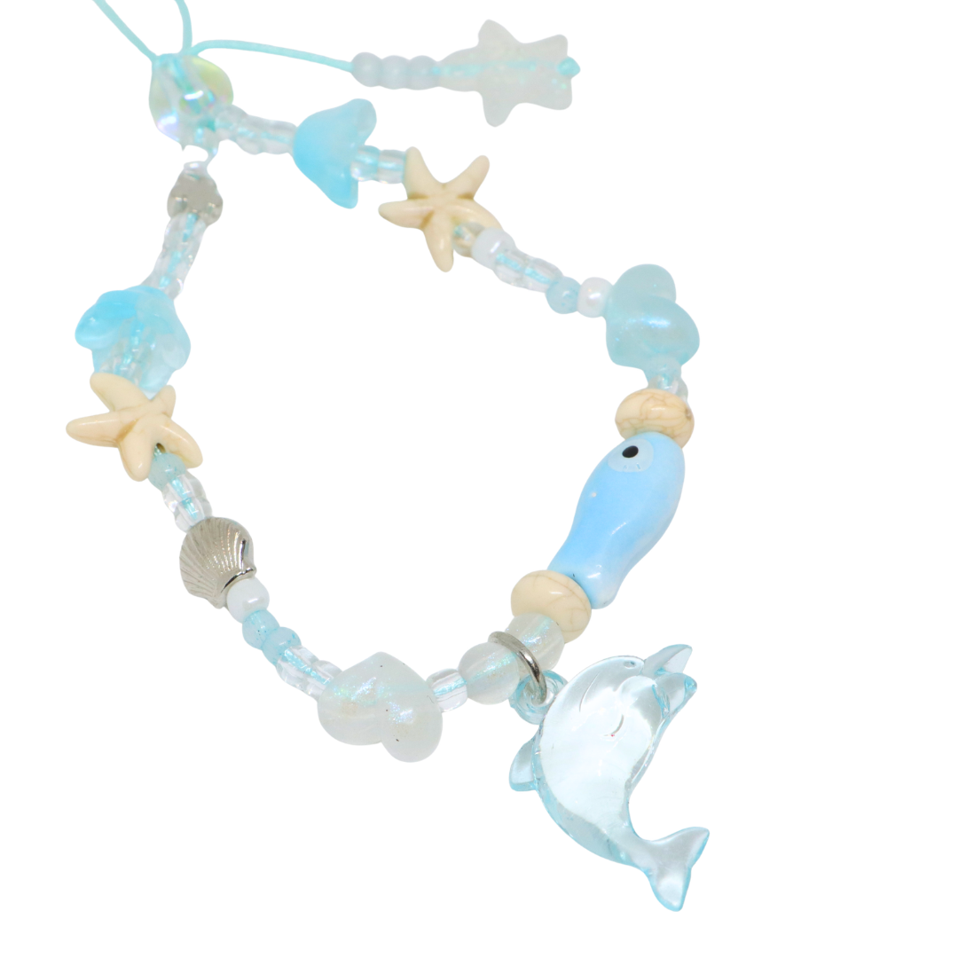 Caser Custom Brown Baby Blue Dolphin phone charm, product photo