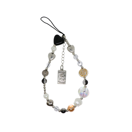 Caser Custom Black & Silver Queen Head Tag phone charm, detail view