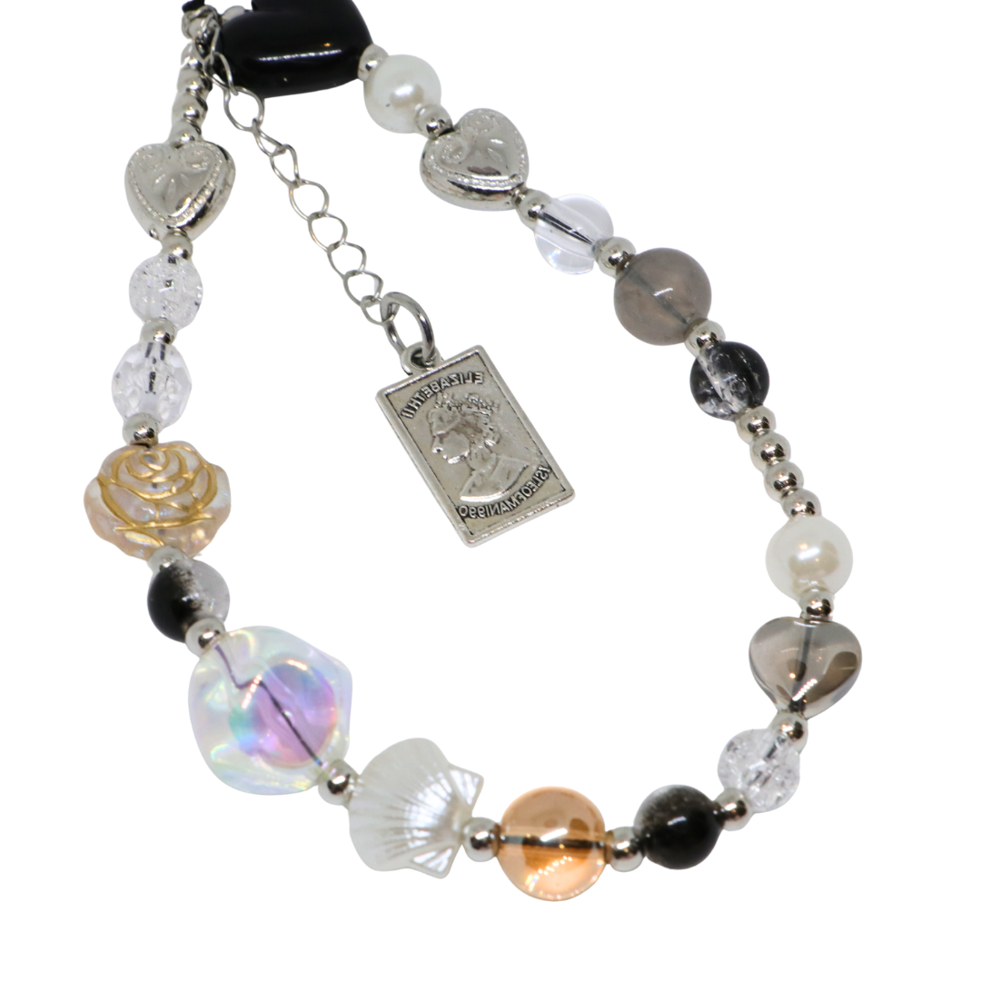 Caser Custom Black & Silver Queen Head Tag phone charm, product photo