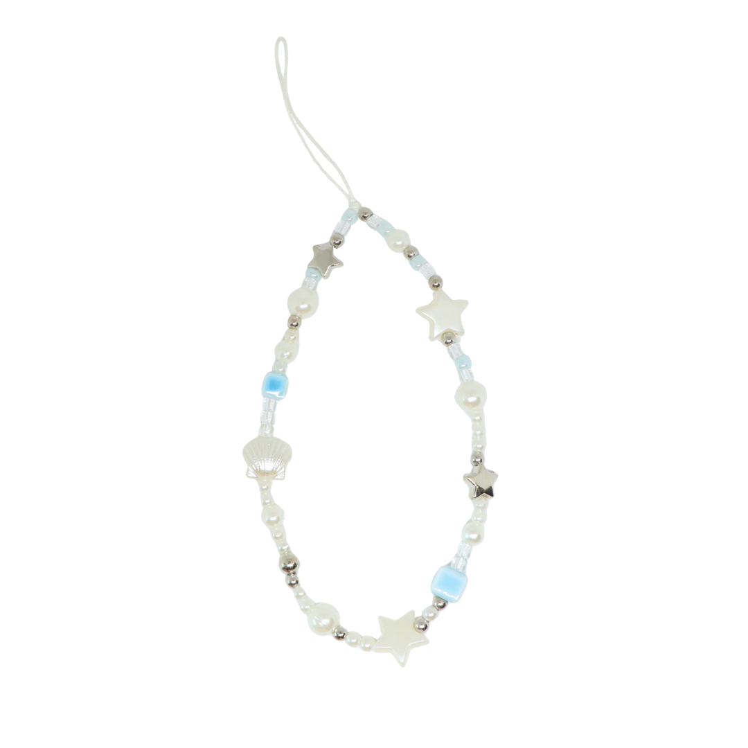 Caser Custom Blue and White Pearl Shell with Silver Stars phone charm, detail view