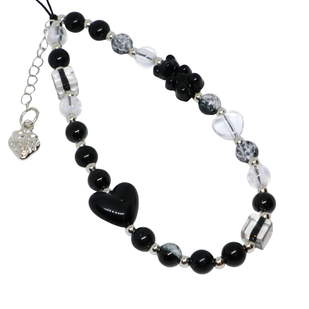 Caser Custom Black Gummy Bear with Silver Strawberry phone charm, product photo