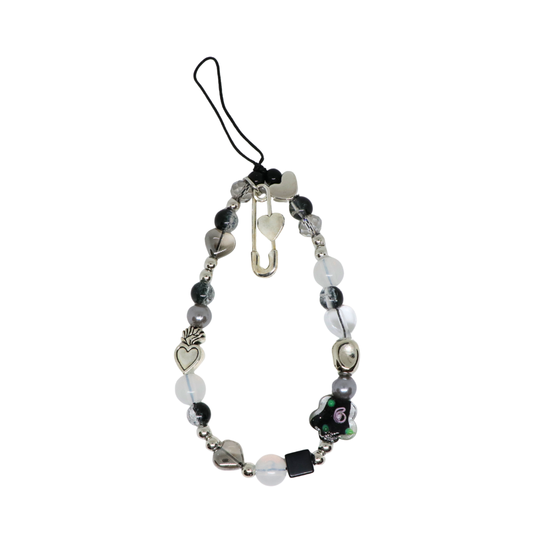 Caser Custom Black Floral with Silver Pin phone charm, detail view