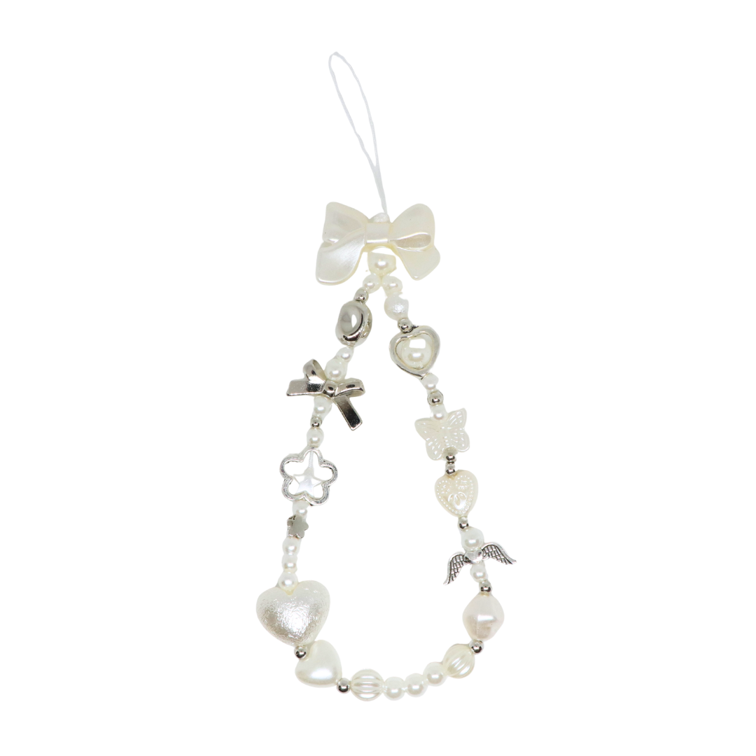 Caser Custom Pearl Bow with Silver Wings phone charm, detail view