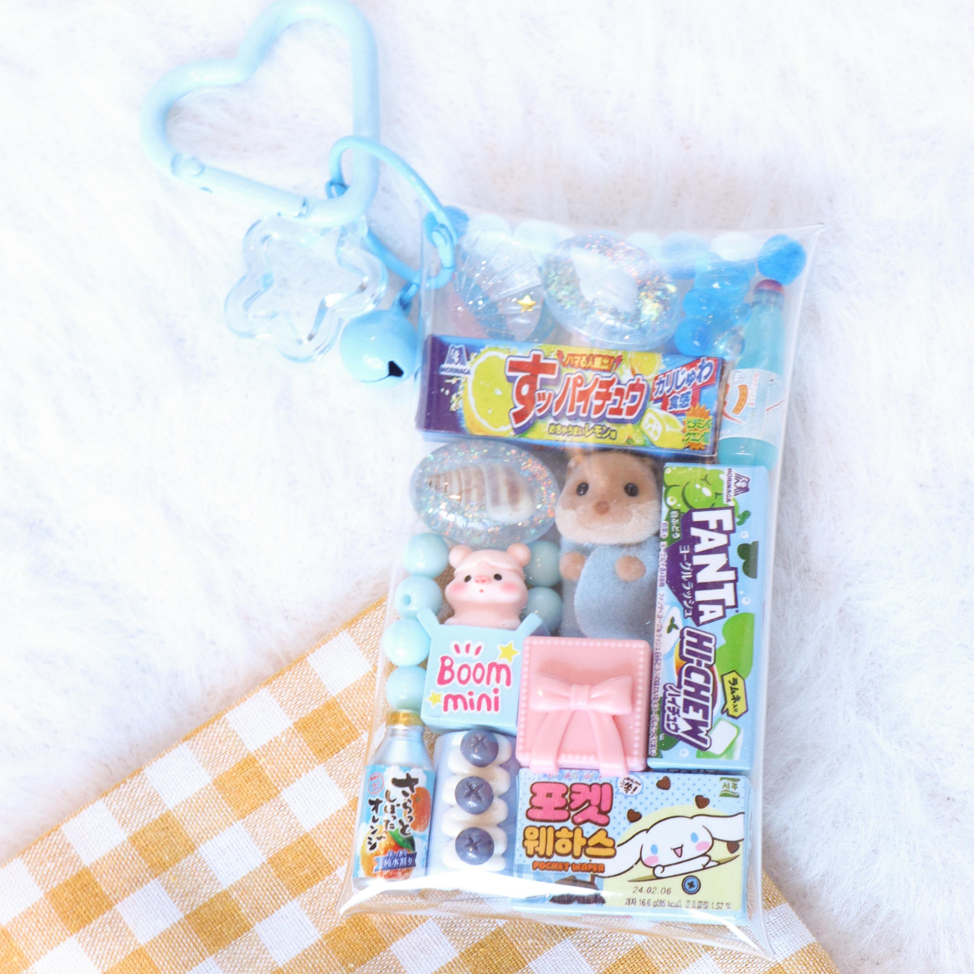 Packaged toy set with characters on a white background