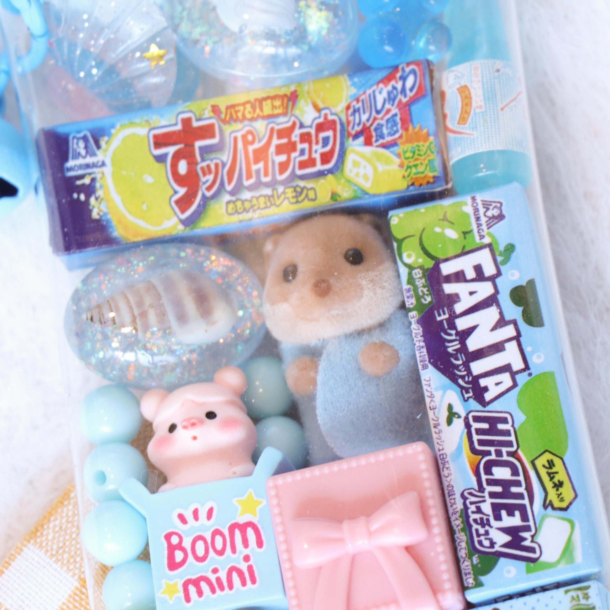 Packaged candy with cartoon characters and colorful packaging on a white background